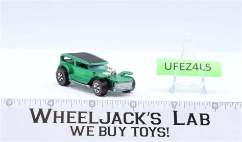 The Demon Green Redline Hot Wheels Mattel Vintage Redline RL Wheeljack S Lab