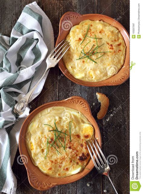 French Cuisine Gratin Eggs And Onions With Bechamel Sauce And Cheese