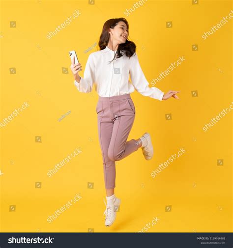 Smiling Asian Woman White Shirt On Stock Photo 2169766381 Shutterstock