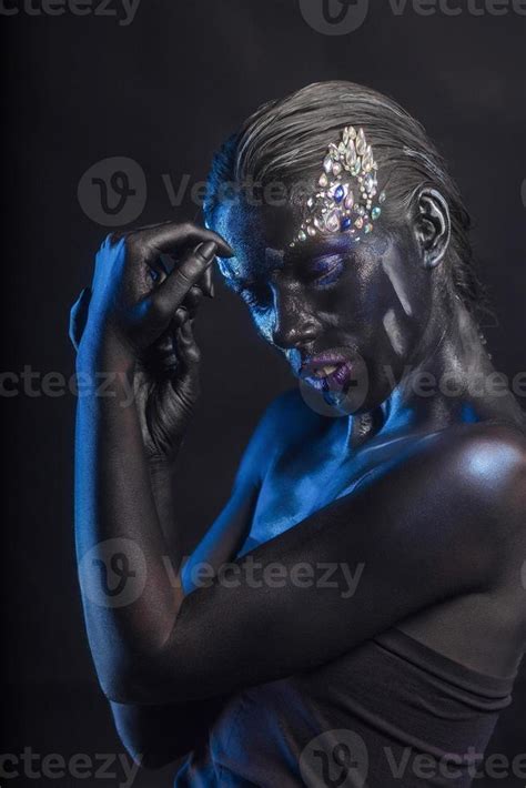 Lovely Brunette With Makeup On Her Face Stock Photo At Vecteezy