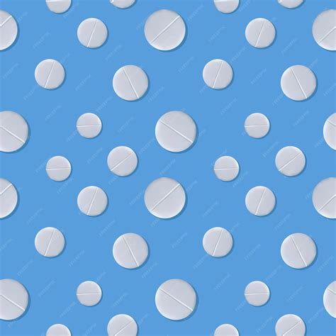 Premium Vector | White pills on a blue background Seamless pattern The