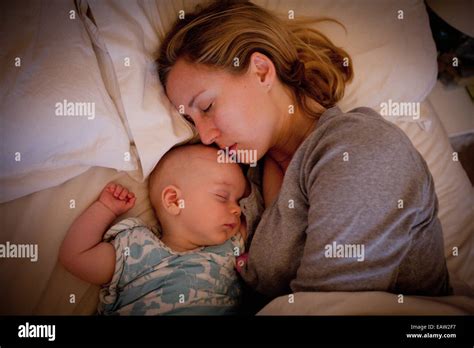 Mother And Baby Sleeping Stock Photo Alamy