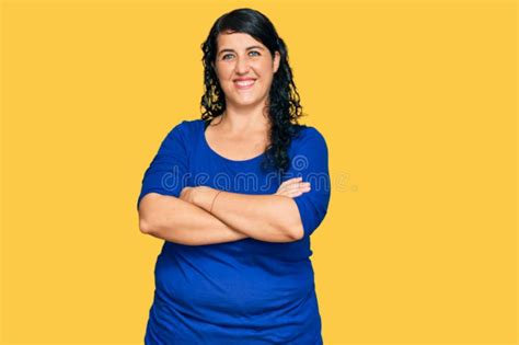 Plus Size Brunette Woman Wearing Casual Clothes Happy Face Smiling With Crossed Arms Looking At