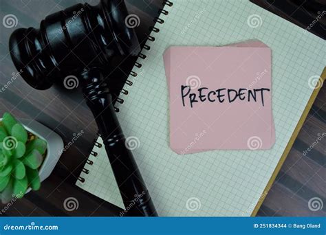 Concept Of Precedent Write On Sticky Notes With Gavel Isolated On