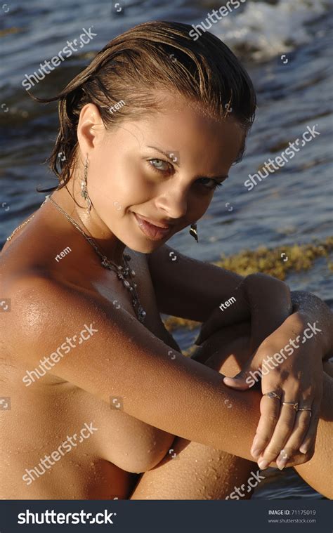 Beautiful Naked Woman Sitting On Beach Stock Photo 71175019 Shutterstock