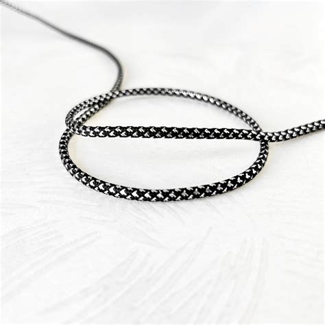 Metallic Silver And Black Braided Cord Rose Mille