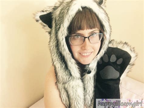 Sexy Nerd Chick Spreading Her Legs And Showing Her Trimmed Pussy Photos