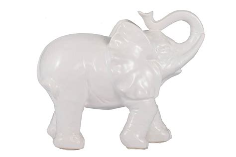 Статуэтки слоники в интерьере 82 фото