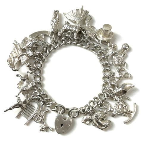 Vintage Silver Charm Bracelet with 22 Charms – Bancroft Antiques