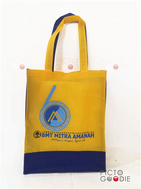 Tas Spunbond – Kuning Biru – Mitra Amanah – Surabaya – Pictogoodie