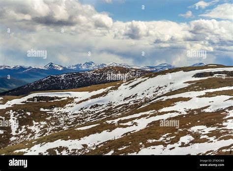 Snow On Mountain And Hill Sides Viewed From The Top Of The World
