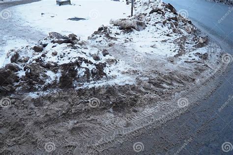 Snow, Ice, Slush and Winter Mud at a Pedestrian Crossing. the Air ...