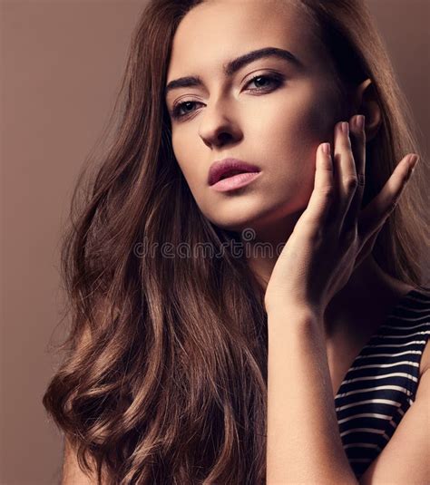 Beautiful Woman With Nude Natural Makeup And Long Brown Curly Ha Stock Photo Image Of Girl
