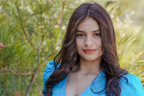 Cute Adult With Brunette Hair Against A Hazy Background 10099392 Stock Photo At Vecteezy