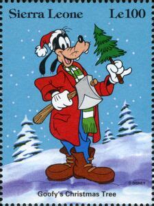 Stamp: Goofy's Christmas Tree - Goofy with Christmas tree and axe ...