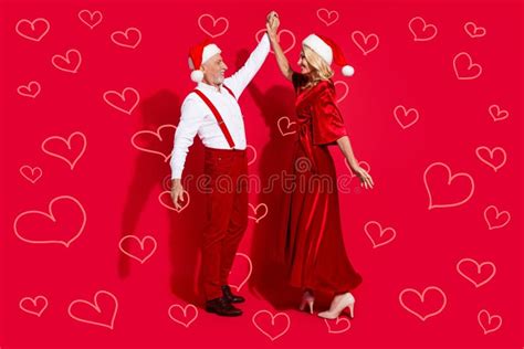 Full Body Photo Of Mature Husband Wife Have Fun Dance Event Xmas Atmosphere Isolated Over Red