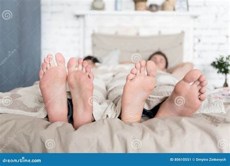 Close Up Of Gay Couples Feet Lying In Bed Stock Image Image Of Care Alternative