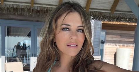 Liz Hurley Risks Spilling Out Of Teeny Bikini After Eye Popping Braless Running Video Daily Star
