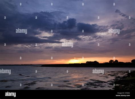 Sun Sets over Osea Leisure Park near Causeway to Osea Island in Essex ...