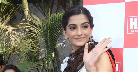 INDIAN ACTRESS Bollywood Acress Sonam Kapoor Hot Backless Red Saree At Latest Event