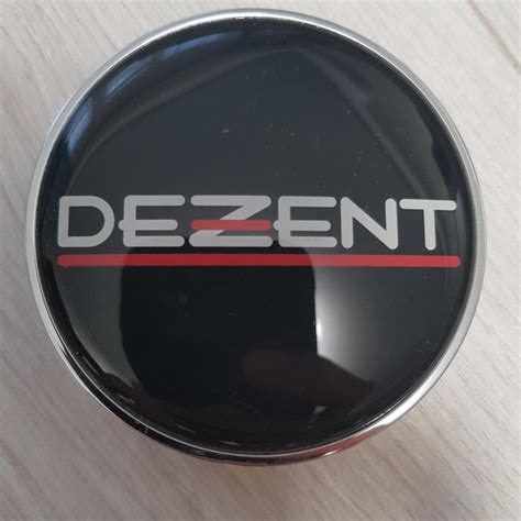 Заглушки на центральное отверстие колпачки DEZENT – купить в Москве ...