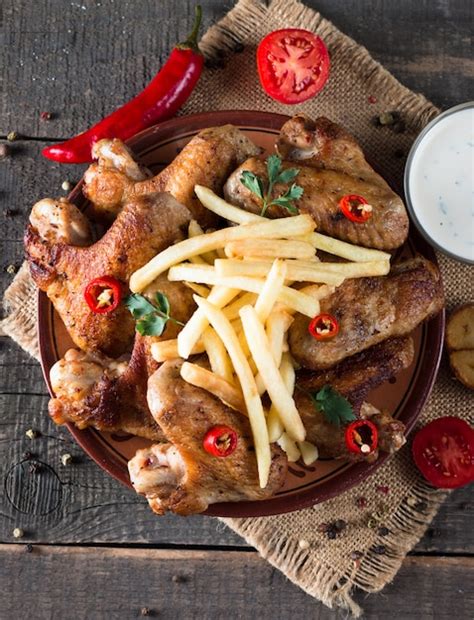 premium photo chicken wings  fries