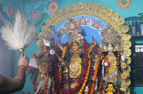 priest performing rituals   morning  dasami day  durga