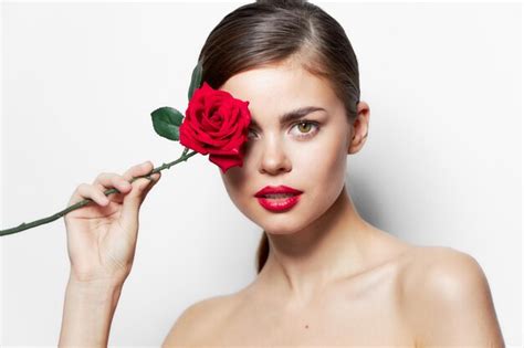 Premium Photo Woman Portrait Red Lips Nude Shoulders Of A Rose Flower Near The Face Clear Skin
