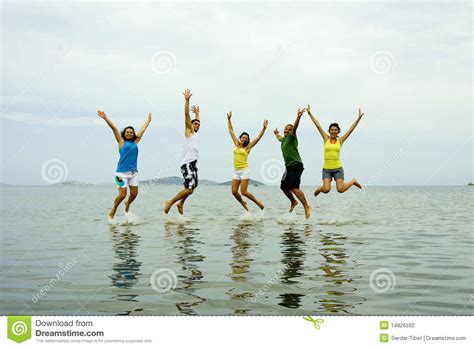 Beach Jumping Stock Photo Image Of Friend Holiday Beach 14826592