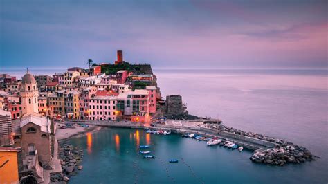 Wallpaper Aerial View Of City Buildings Near Body Of Water During Daytime Background Download