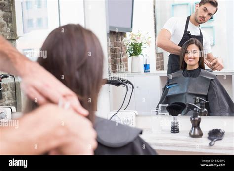Pretty Brunette Getting Her Hair Cut Stock Photo Alamy