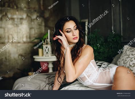 Beautiful Woman Lingerie Showing Long Legs Stock Photo