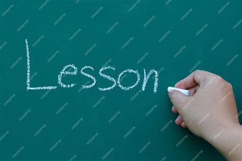 premium photo cropped hand writing  blackboard