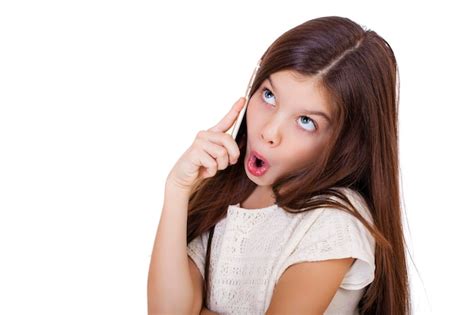 Premium Photo Portrait Of Brunette Caucasian Schoolgirl Calling By Phone Isolated On White
