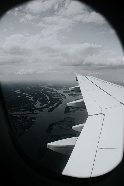 Porthole Airplane Wing View Overview Hd Phone Wallpaper Peakpx