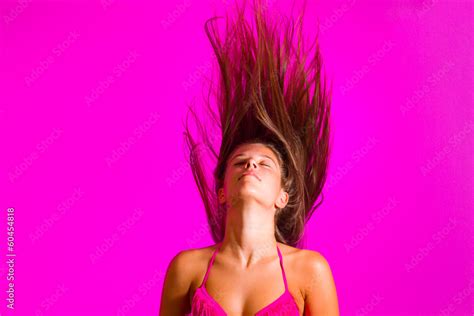 Brunette In Bikini Posing On Pink Background Stock Photo Adobe Stock
