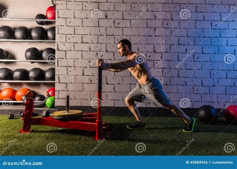 Sled Push Man Pushing Weights Workout Stock Photo Image Of Building