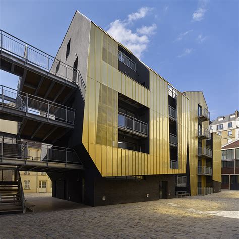 Gold Metal Panels Clad Metek Architecture S Social Housing Project In Paris