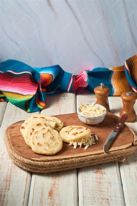 Premium Photo | Arepa made from ground corn dough cornmeal traditional