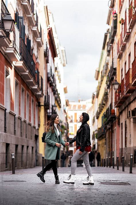 Lesbian Couple Having Fun by Stocksy Contributor Santi Nuñez Stocksy