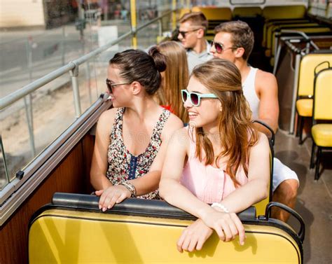 Group of Smiling Friends Traveling by Tour Bus Stock Image - Image of ...