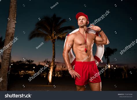 Handsome Lifeguard Naked Torso Lifebuoy His Stock Photo Shutterstock