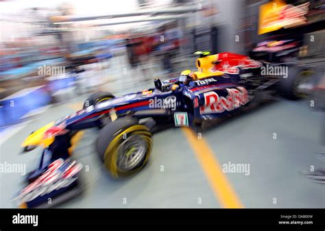 Australian Formula One Driver Mark Webber Of Red Bull Steers His Car