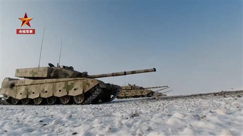 Chinese Ztz 99a Tanks Charging During Winter Exercise In Xinjiang