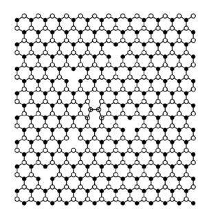 Graphene lattice after introducing defects in the structure of Figure ...