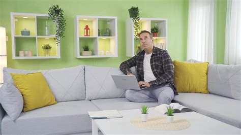 Neighbors throwing a house party are disturbing the man. Man In The