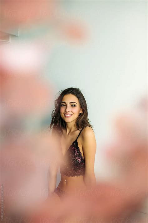 Sensual Woman In Lingerie Posing For Camera By Stocksy Contributor VICTOR TORRES Stocksy