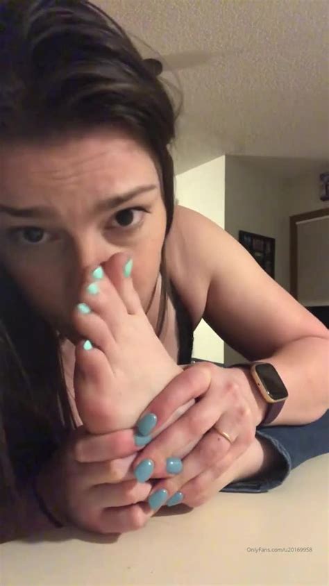 Saucy Brunette Touching And Sniffing Her Sexy Feet And Toes In A Solo Feet9