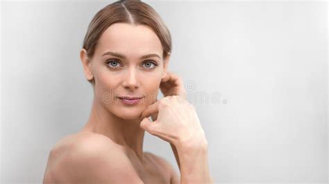 Seductive Naked Beautiful Female Touching Face Neck Shoulder Smooth Skin Posing Looking At