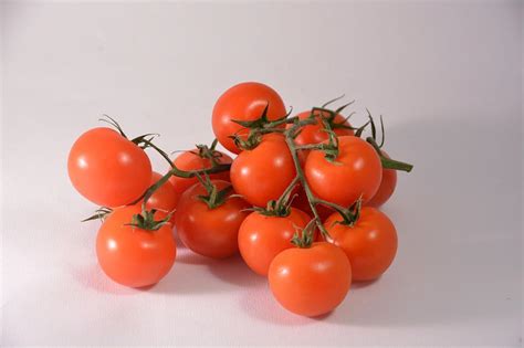 Free Stock Photo Of A Bunch Of Fresh Red Tomatoes On A Light Background